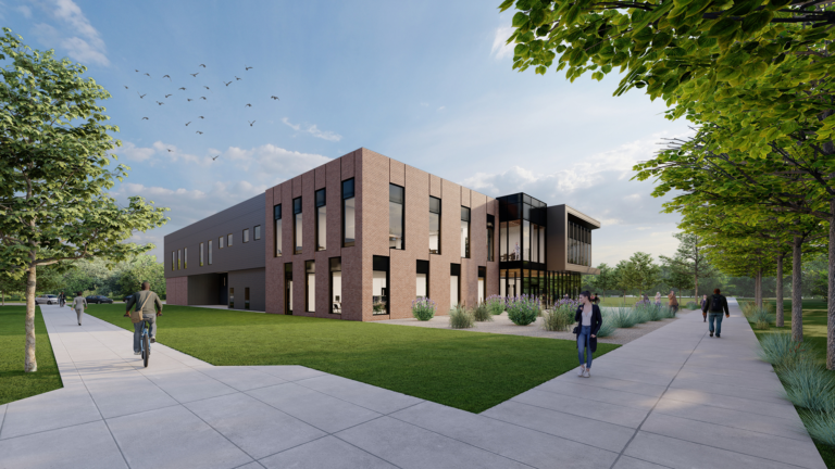 Exterior rendering of college Treasure Valley Community College Nursing Center with walking path and greenery
