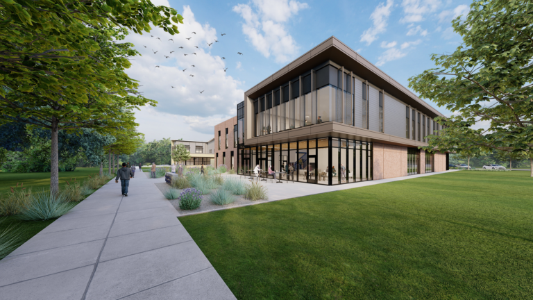 Exterior rendering of Treasure Valley Community College Nursing Center with walking path and greenery